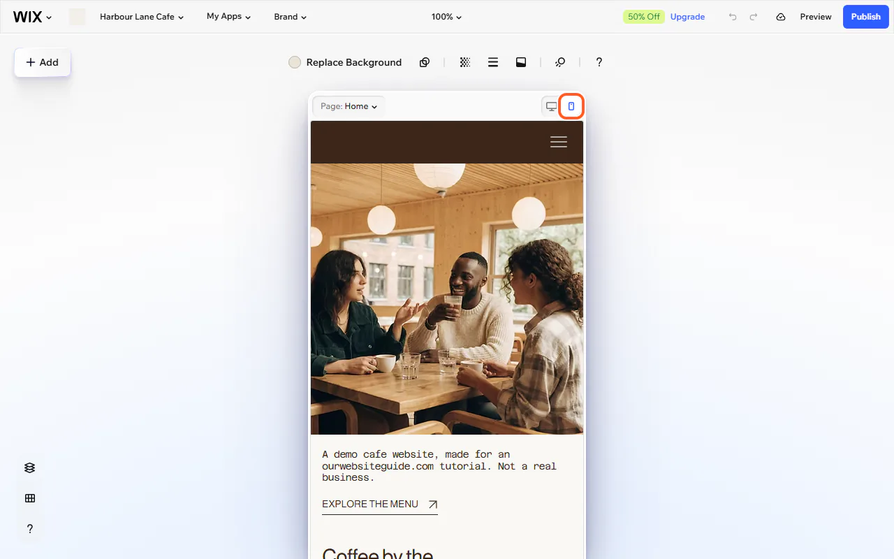 The Wix editor switched to mobile view, with the mobile view button outlined